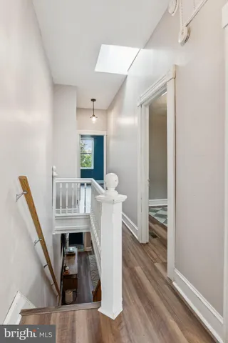 a workspace with furniture and a window