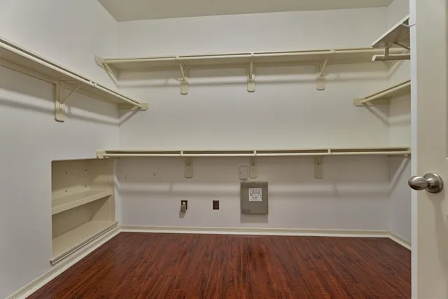 a view of a room with racks on the wall
