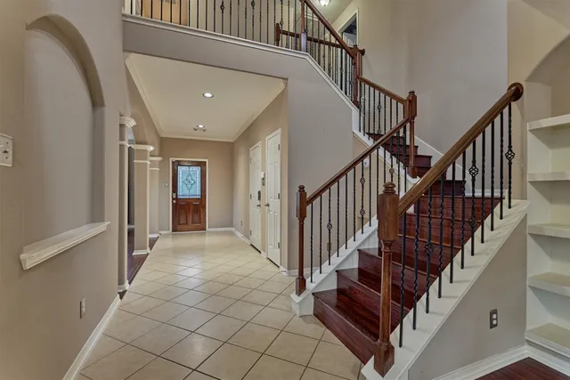 a view of entryway with wooden floor