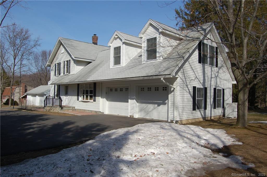 55 Straitsville Road Prospect, CT 06712 - Photo 1 of 1 a front view of a house with a yard