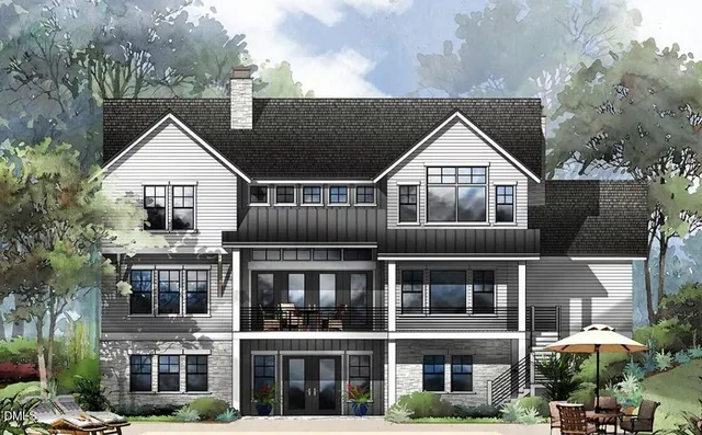 a front view of residential houses and yard