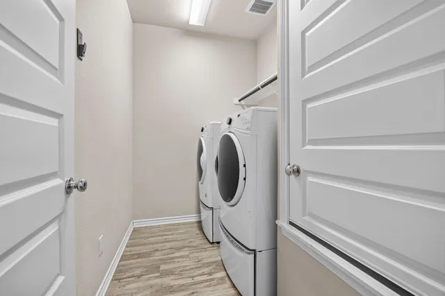 a utility room with a washer and dryer