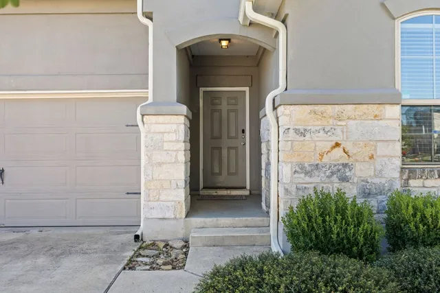 a front view of a house with a shower