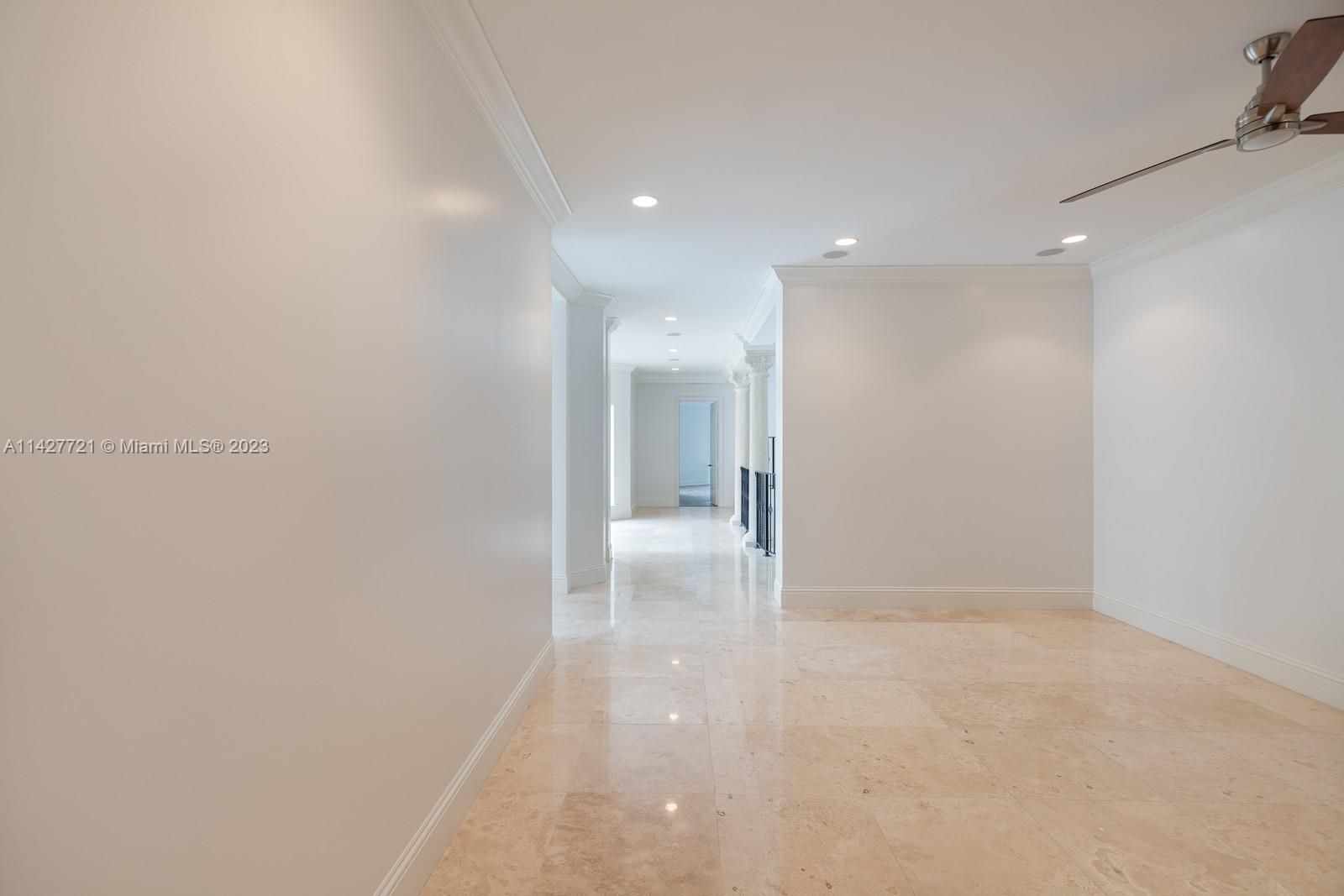 3471 Main Highway, Unit 928 Miami, FL 33133 - Photo 17 of 40 a view of hallway with stainless steel appliances