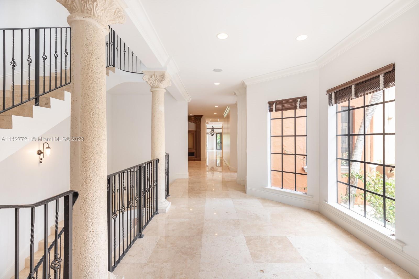 3471 Main Highway, Unit 928 Miami, FL 33133 - Photo 23 of 40 a view of an entryway with wooden floor