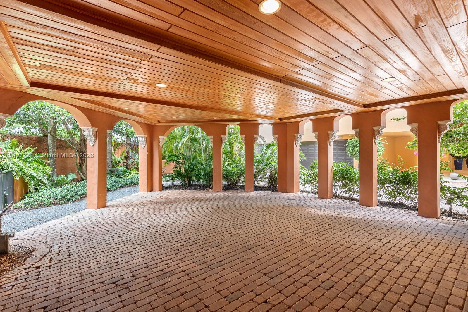 3471 Main Highway, Unit 928 Miami, FL 33133 - Photo 33 of 40 a view of an empty room with a large windows
