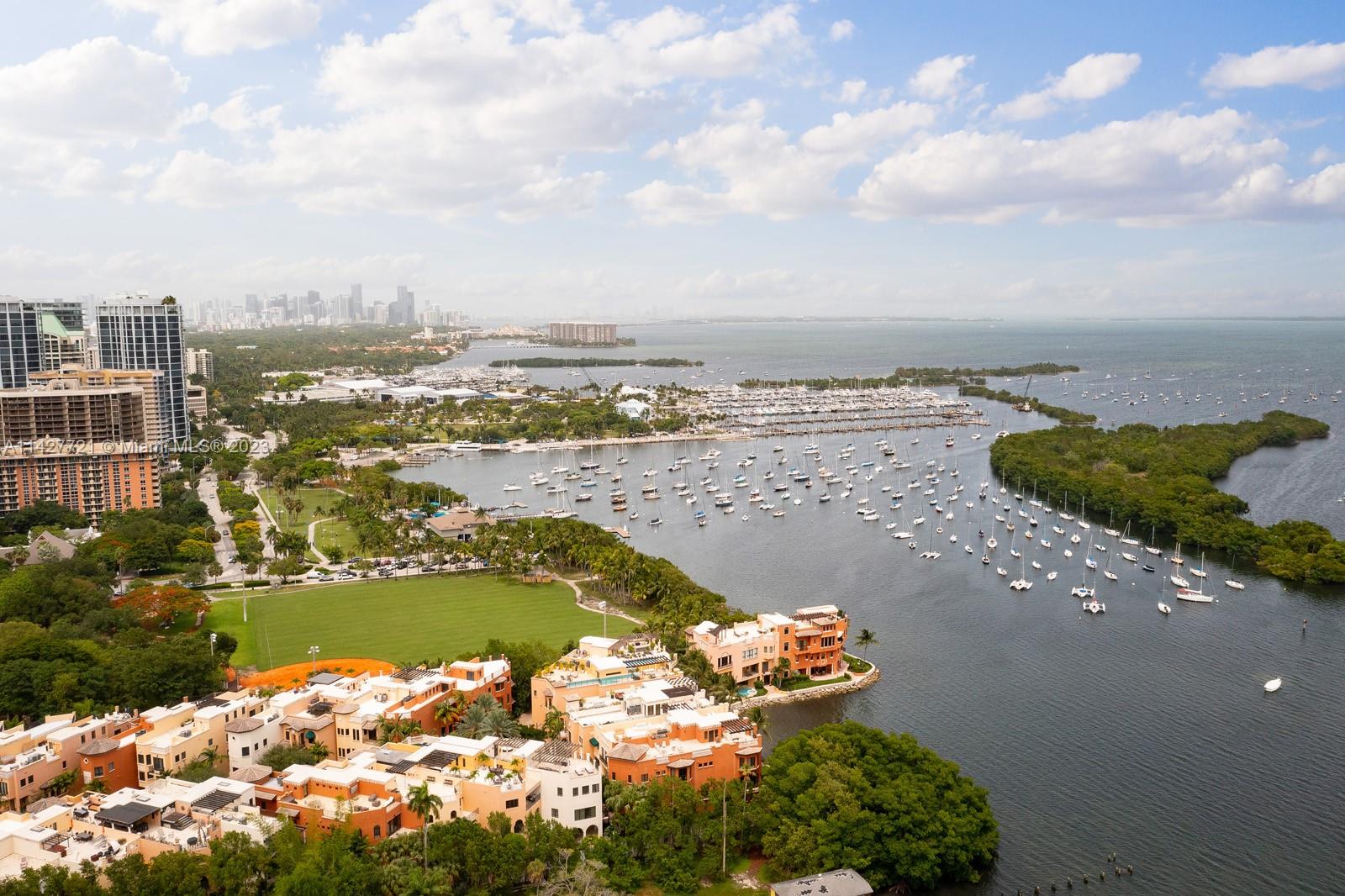 3471 Main Highway, Unit 928 Miami, FL 33133 - Photo 36 of 40 a view of a lake with a city