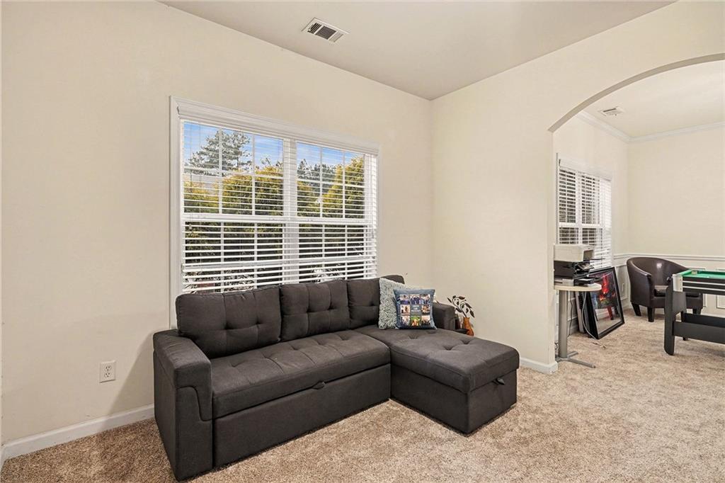 19 Laurelcrest Lane Dallas, GA 30132 - Photo 18 of 53 a living room with furniture and a window
