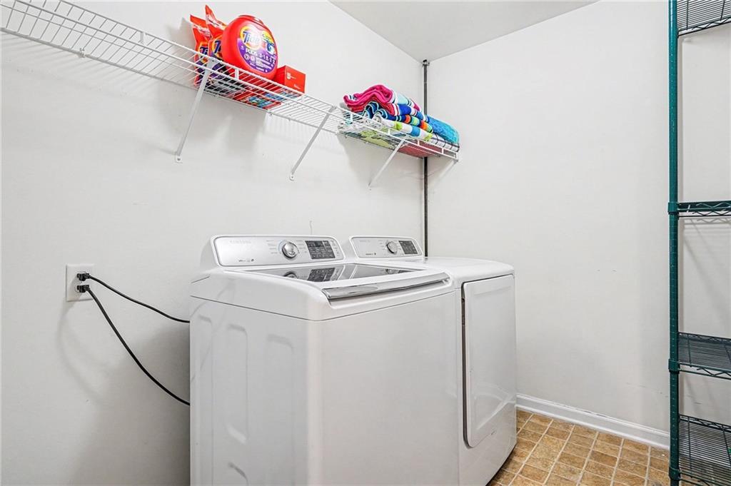 19 Laurelcrest Lane Dallas, GA 30132 - Photo 46 of 53 a utility room with dryer and washer