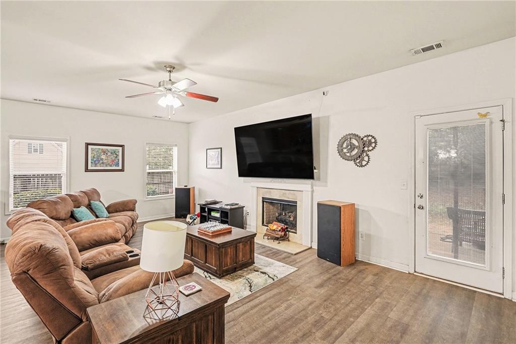 19 Laurelcrest Lane Dallas, GA 30132 - Photo 7 of 53 a living room with furniture and a flat screen tv