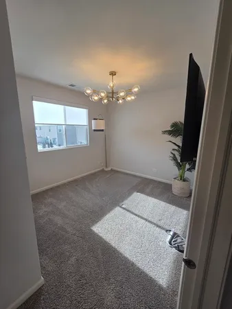 a view of a livingroom with storage space