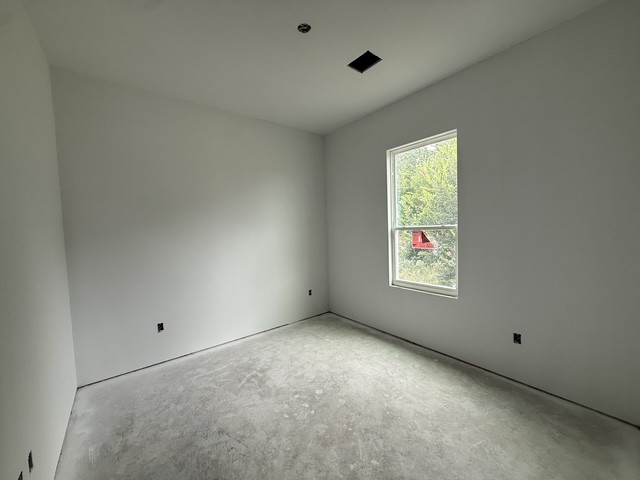 127 Riparian Elms Road Bertram, TX 78605 - Photo 16 of 22 A quiet space awaits customization, offering potential with an outdoor view.