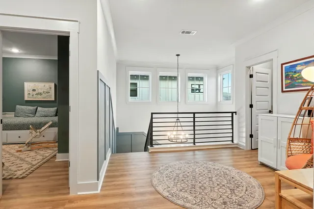a bathroom with a toilet sink and shower