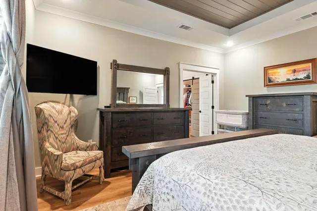 a view of a patio with a table and chairs