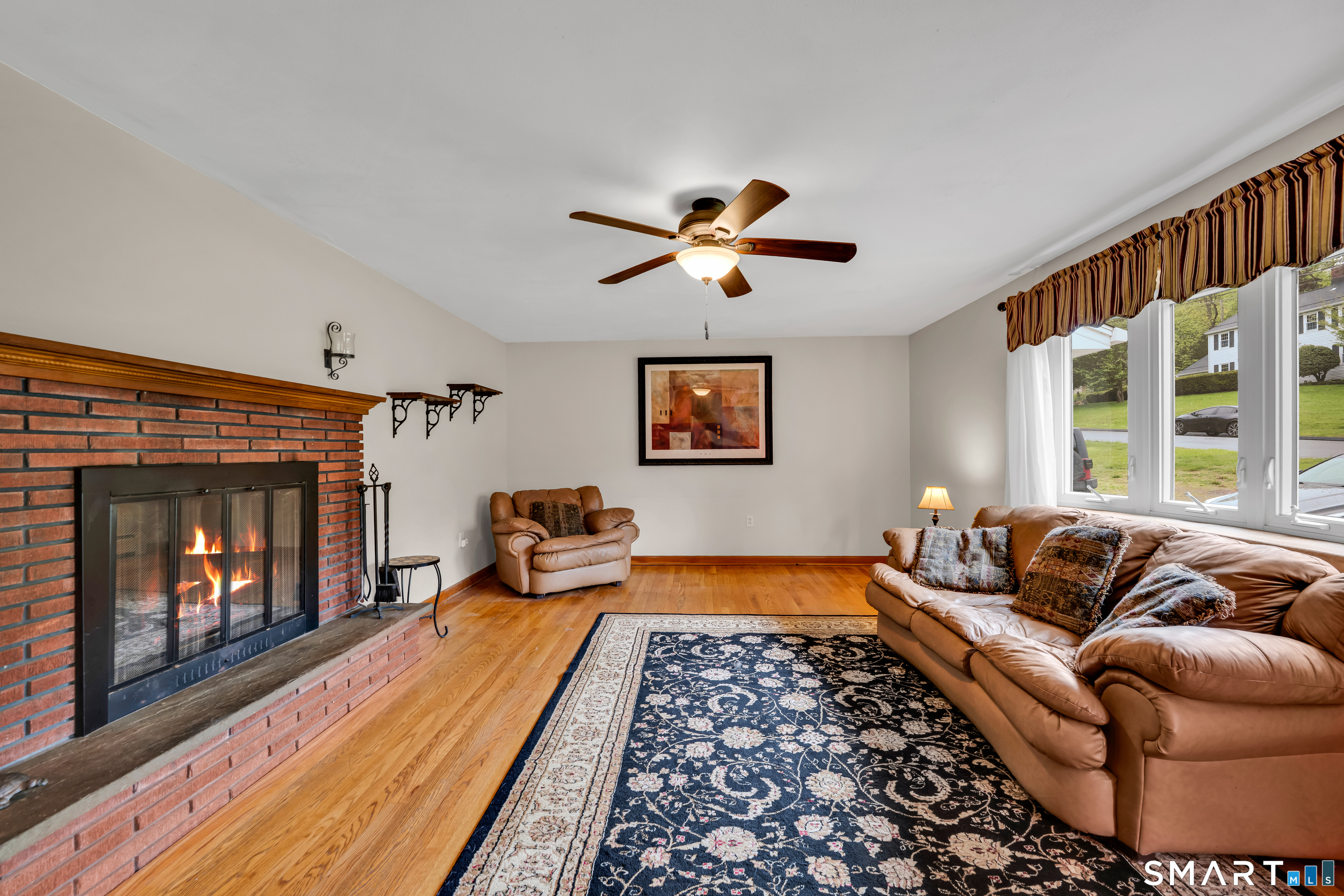 85 Timothy Road Naugatuck, CT 06770 - Photo 4 of 30 a bed room with furniture and a fireplace