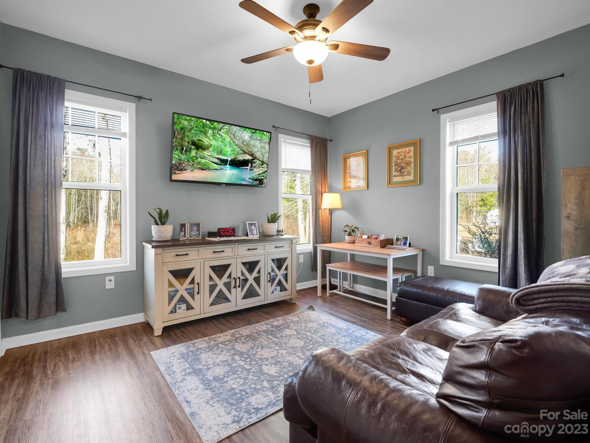 335 Mine Gap Road Flat Rock, NC 28731 - Photo 15 of 40 a bedroom with furniture and a window