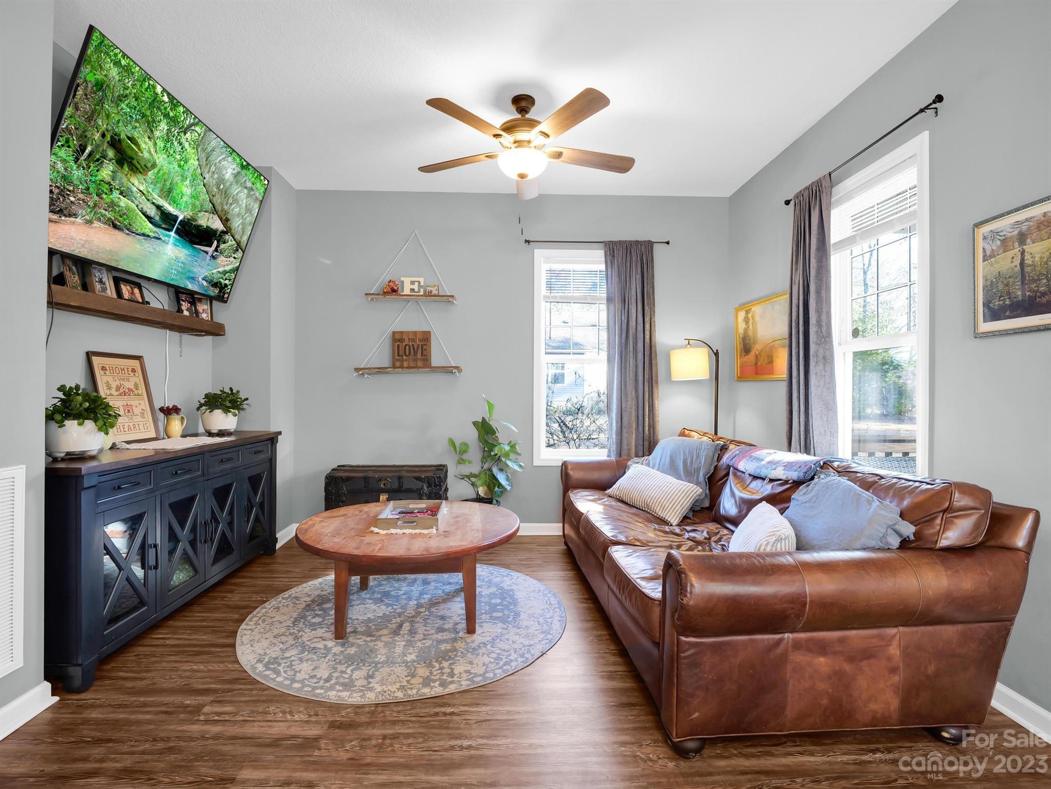 335 Mine Gap Road Flat Rock, NC 28731 - Photo 3 of 40 a living room with furniture and a table