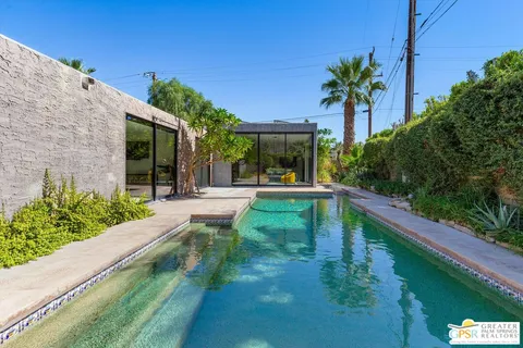 a house view with a garden space