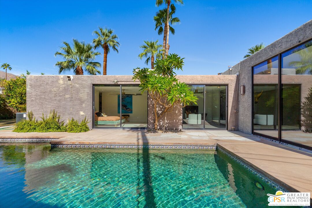 1075 East Suntan Lane Palm Springs, CA 92264 - Photo 31 of 39 a house view with a garden space