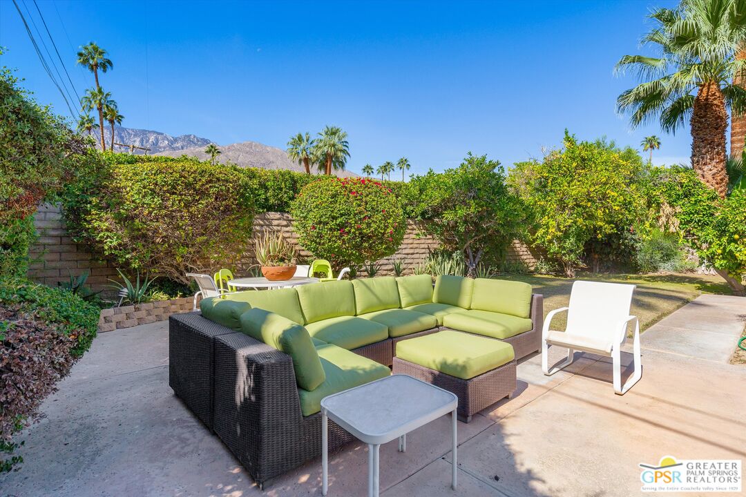 1075 East Suntan Lane Palm Springs, CA 92264 - Photo 35 of 39 a view of a chairs in a patio