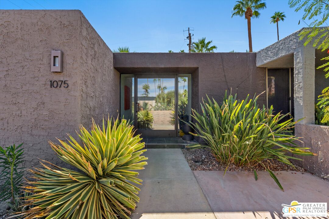 1075 East Suntan Lane Palm Springs, CA 92264 - Photo 36 of 39 a view of a entryway front of house