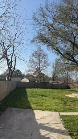 a house view with a outdoor space