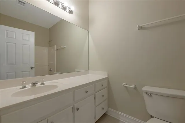 a bathroom with a sink and a toilet