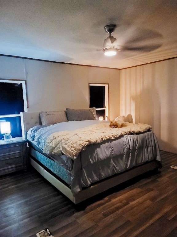 44079 Lee Drive Callahan, FL 32011 - Photo 26 of 32 a bedroom with a bed and a flat screen tv