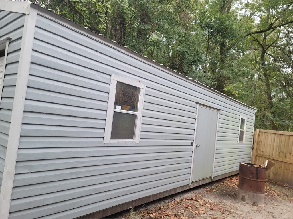 44079 Lee Drive Callahan, FL 32011 - Photo 30 of 32 a view of a back side of house