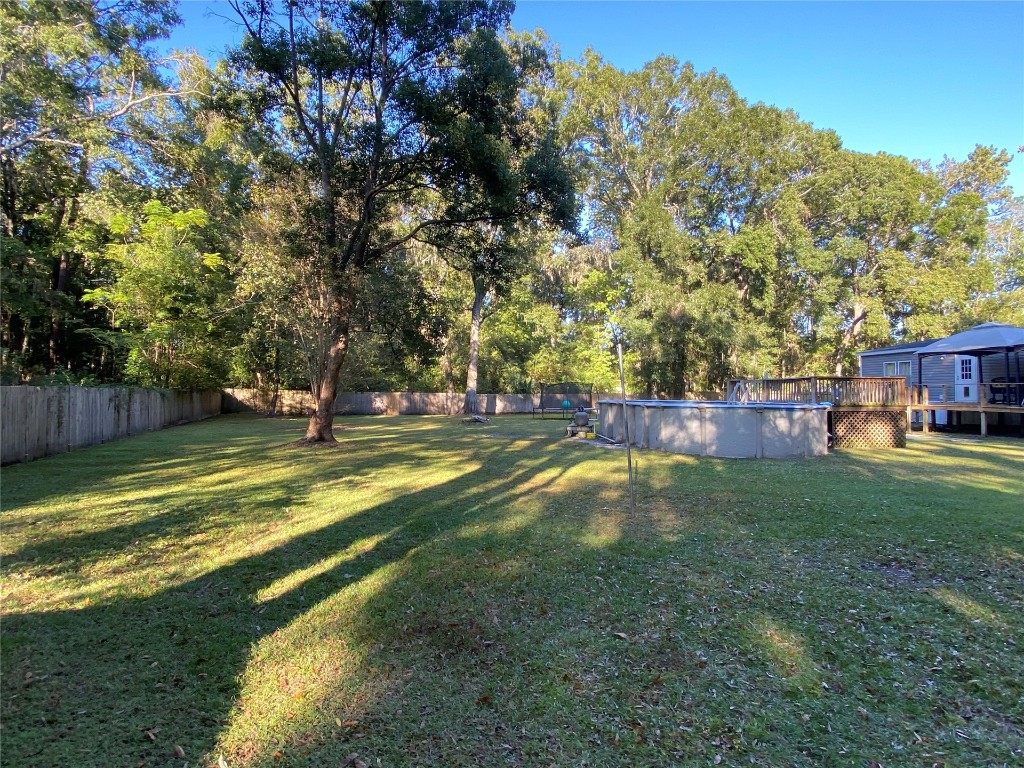 44079 Lee Drive Callahan, FL 32011 - Photo 5 of 32 a view of a house with a backyard