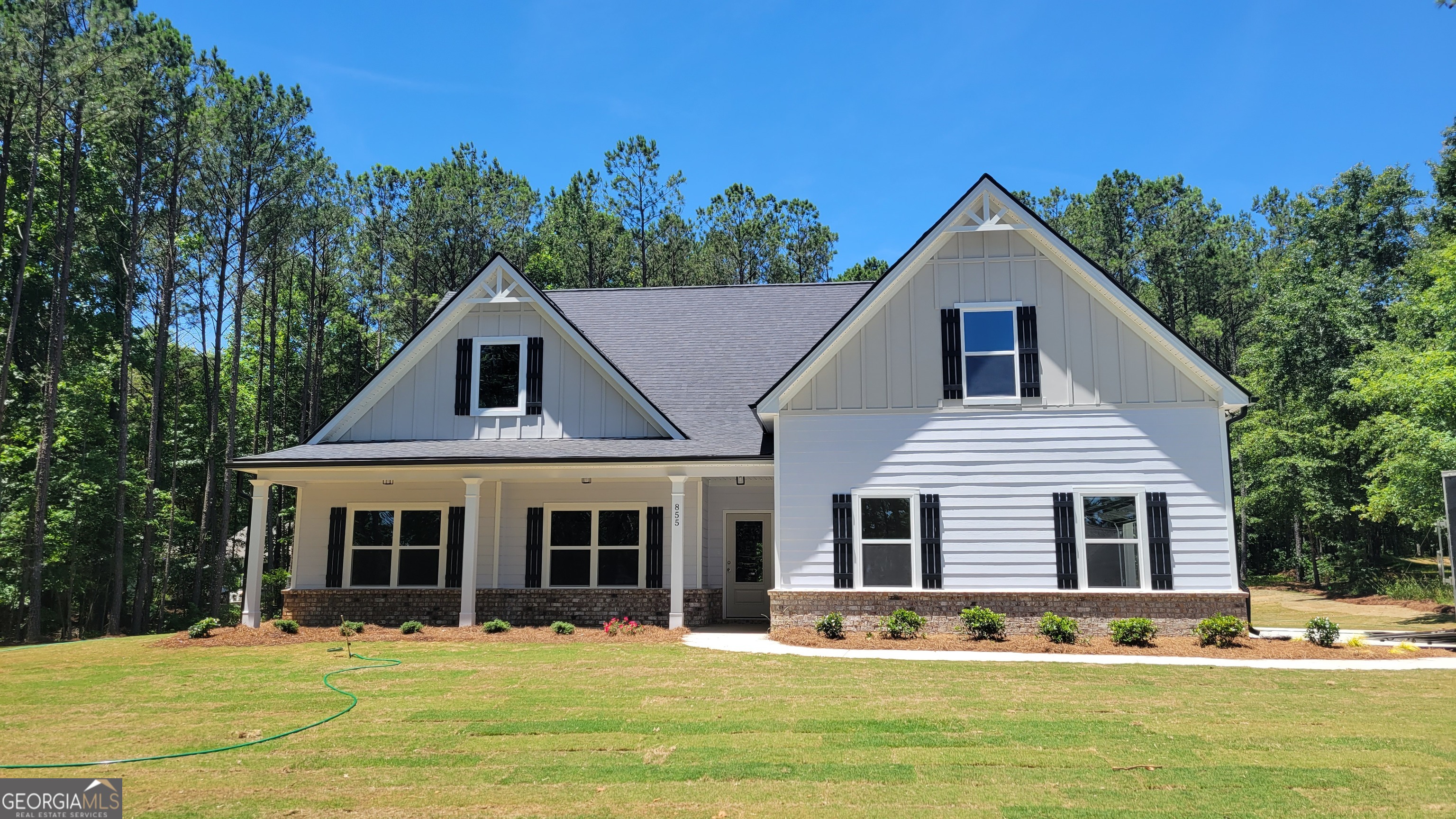 855 North Bethany Road Locust Grove, GA 30248 - Photo 1 of 1 a front view of a house with a yard