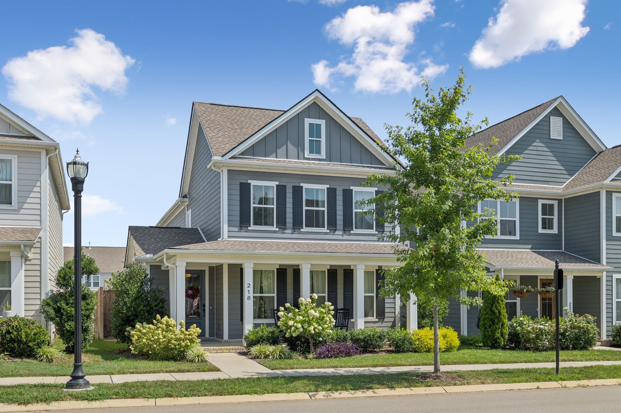 218 Southmen Lane Spring Hill, TN 37174 - Photo 1 of 73 a front view of a house with a yard