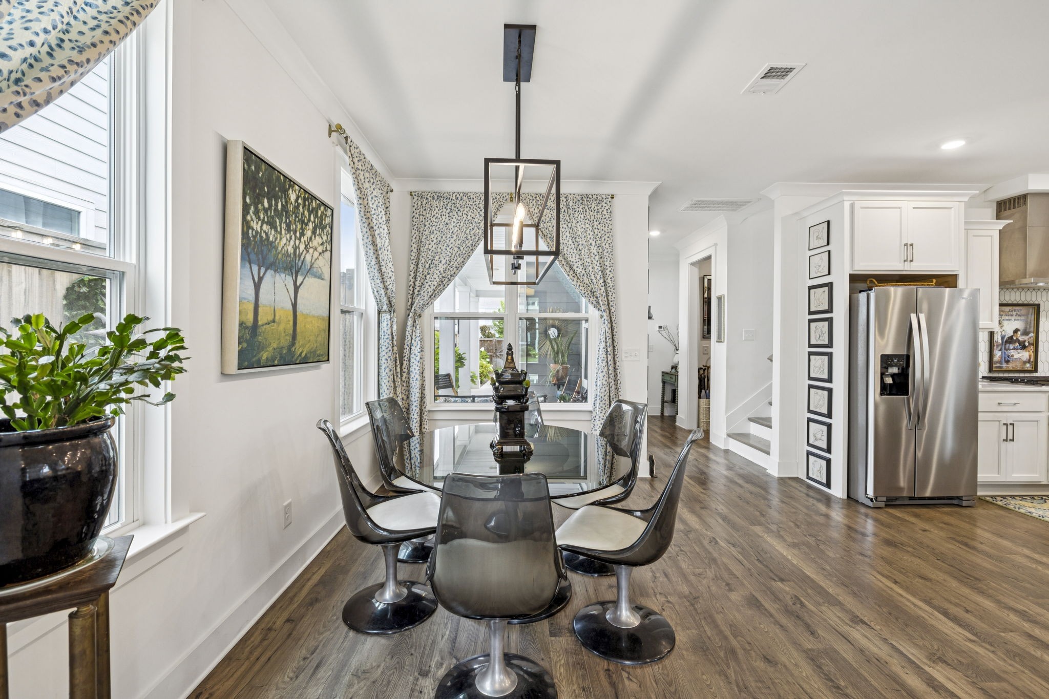 218 Southmen Lane Spring Hill, TN 37174 - Photo 12 of 73 a view of a dining room with furniture window and wooden floor