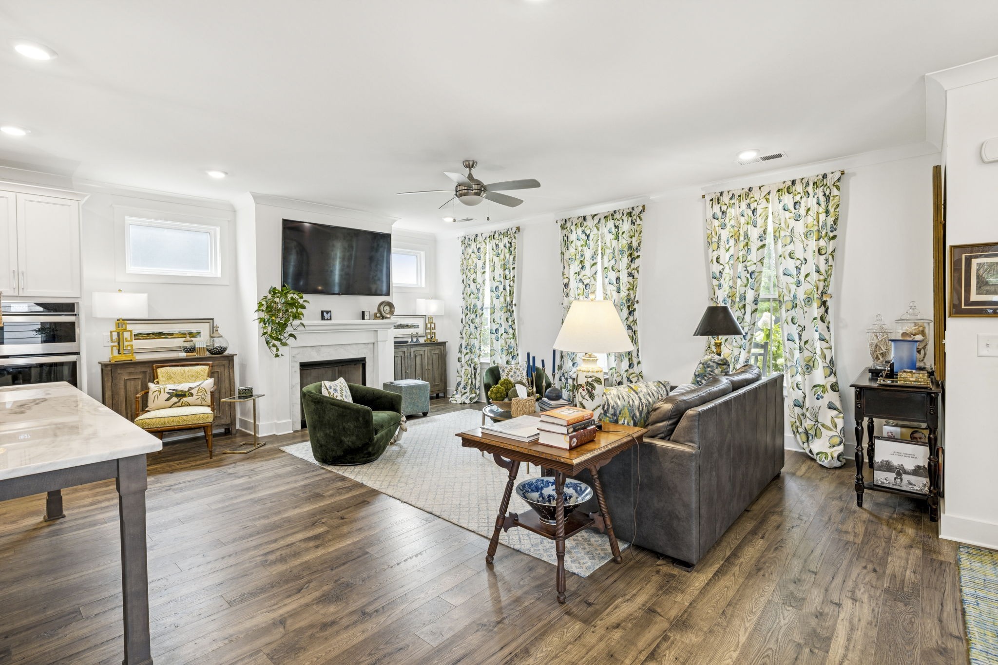 218 Southmen Lane Spring Hill, TN 37174 - Photo 14 of 73 a living room with furniture a fireplace and a flat screen tv