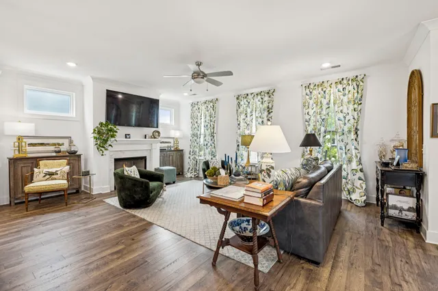 a kitchen with granite countertop a sink a stove and cabinets