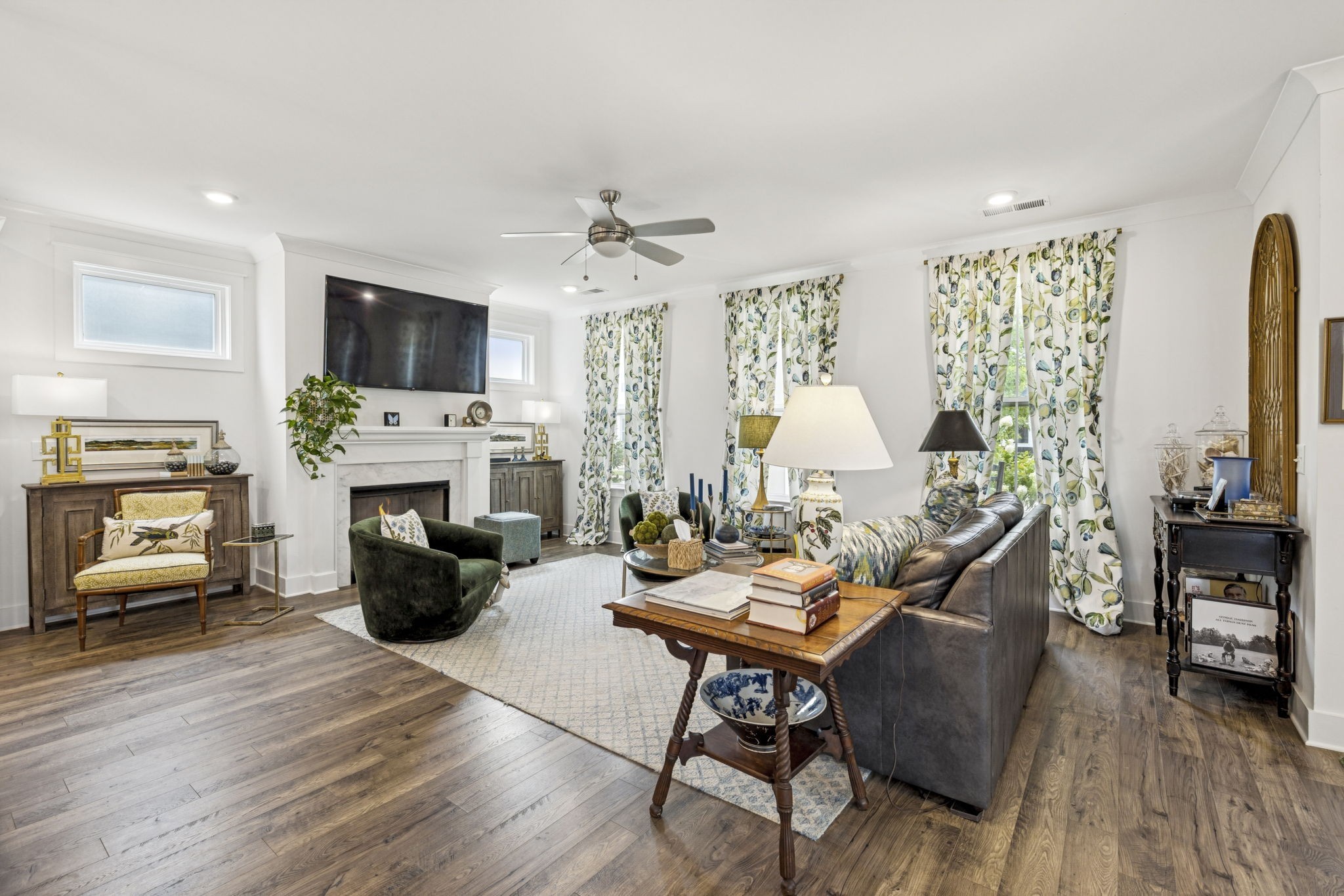 218 Southmen Lane Spring Hill, TN 37174 - Photo 17 of 73 a living room with furniture a fireplace and a flat screen tv