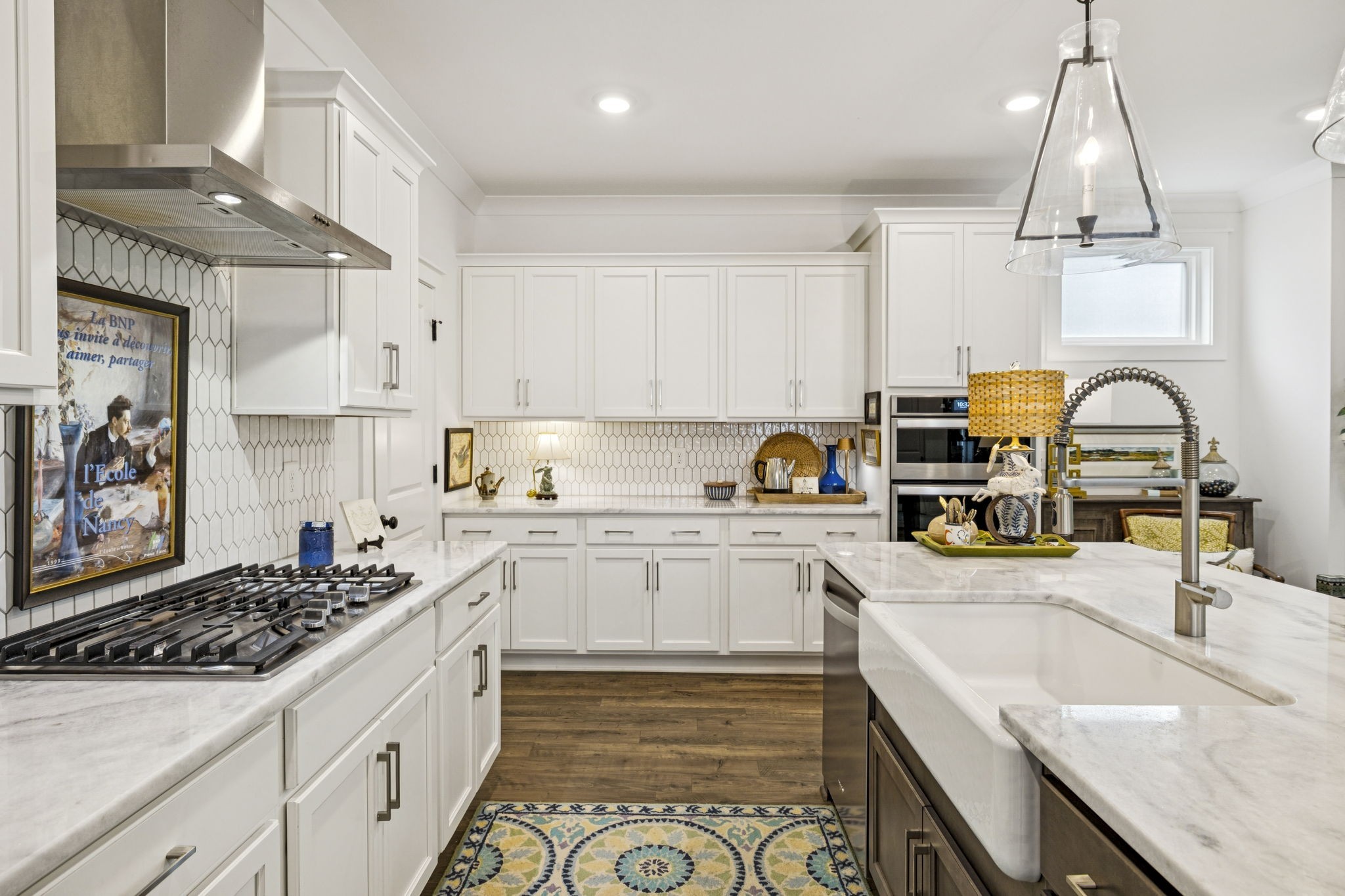 218 Southmen Lane Spring Hill, TN 37174 - Photo 25 of 73 a kitchen with a sink stove and cabinets