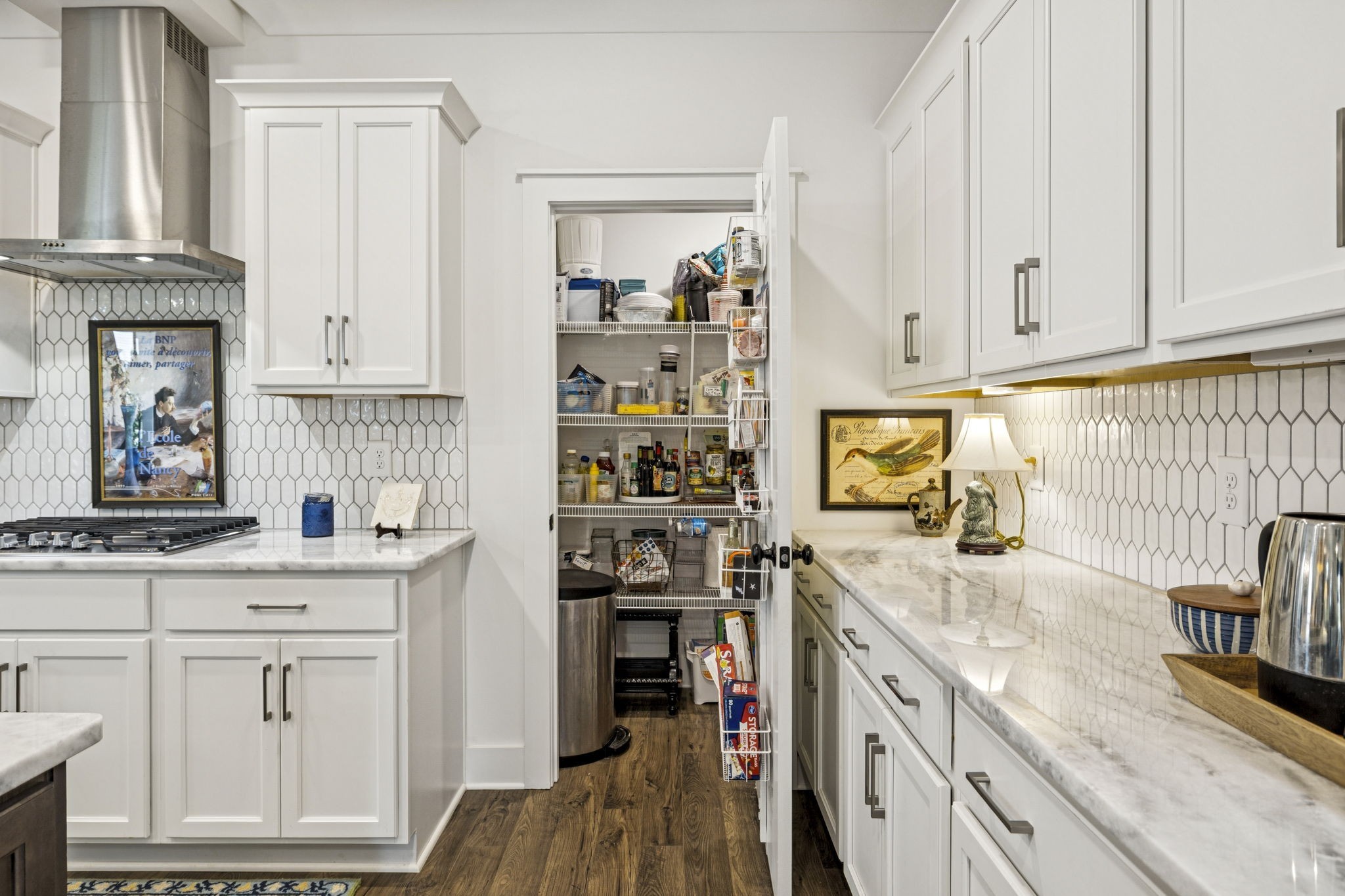 218 Southmen Lane Spring Hill, TN 37174 - Photo 27 of 73 a kitchen with granite countertop a sink a stove and cabinets