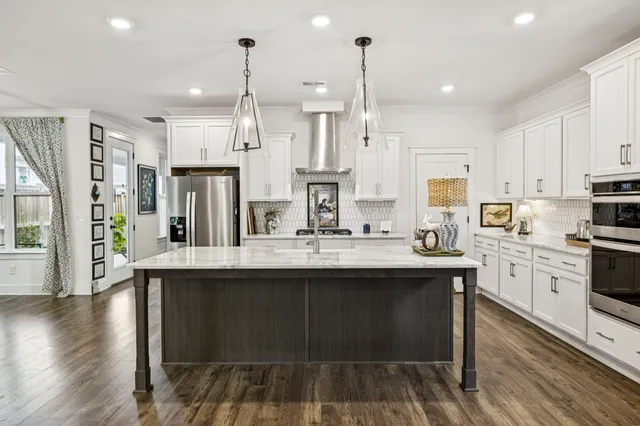 a bathroom with a shower and a sink
