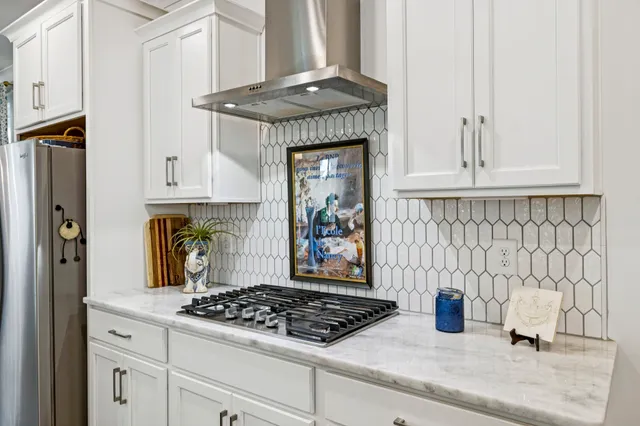 a spacious bathroom with a double vanity sink and a mirror