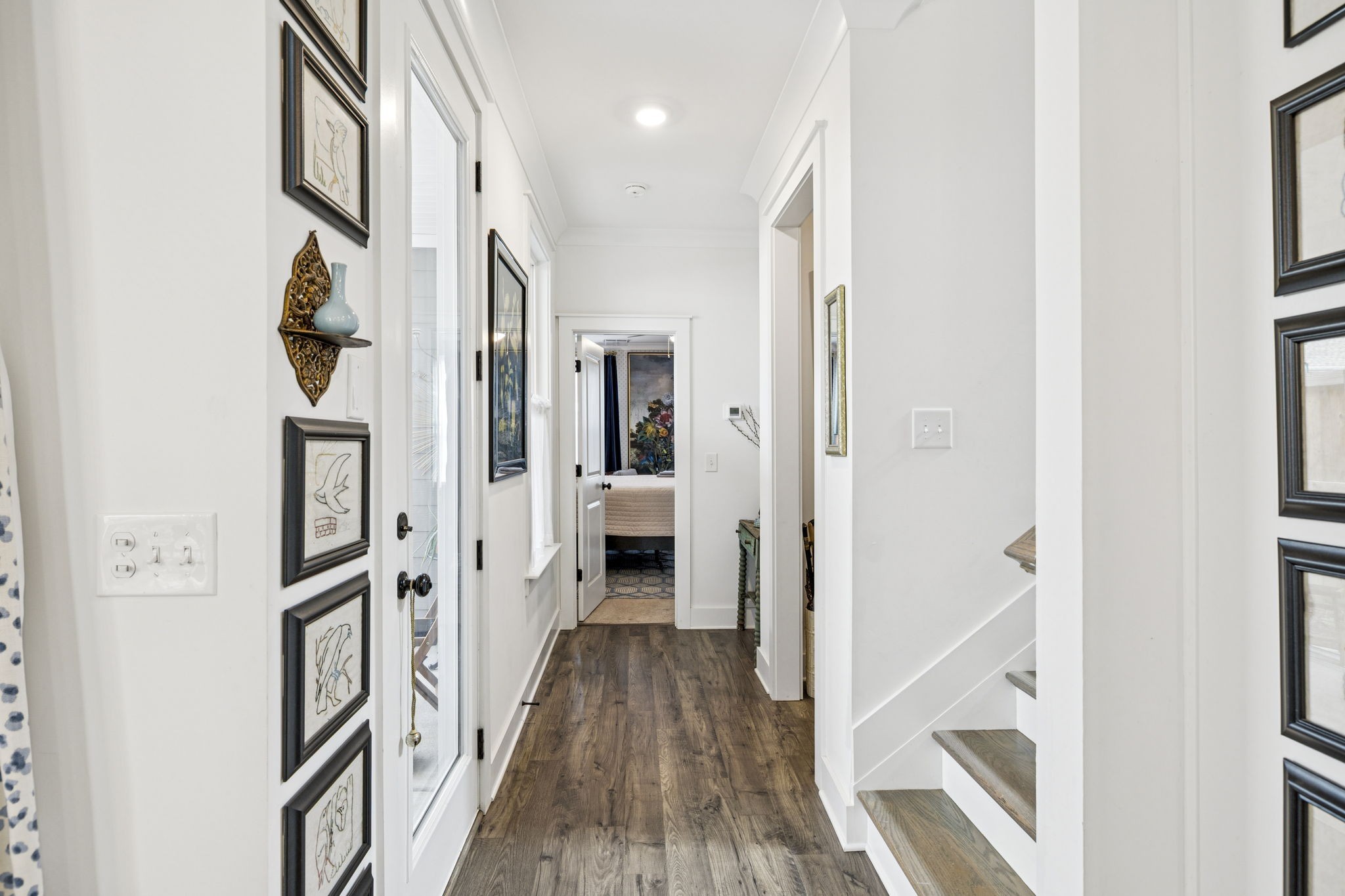218 Southmen Lane Spring Hill, TN 37174 - Photo 33 of 73 a view of a hallway with wooden floor and staircase