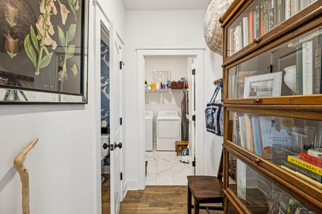 a bedroom with a bed and chair