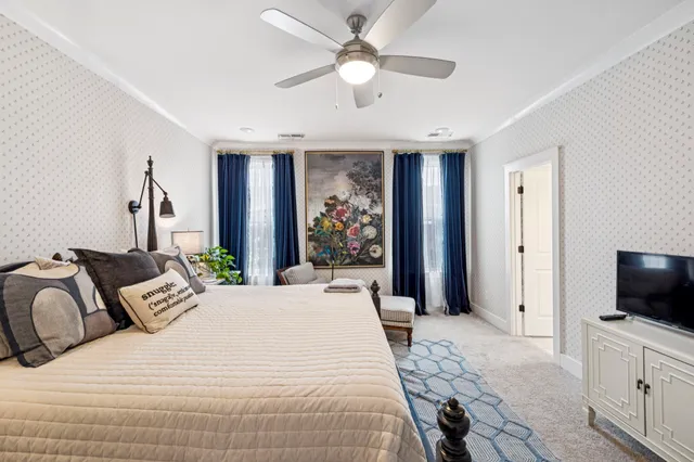 a bedroom with a bed and a cabinets