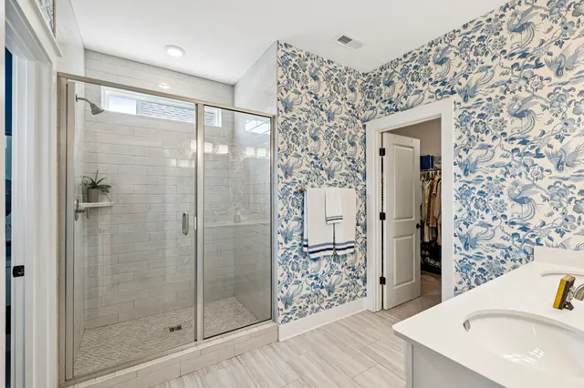 a view of a patio with a chairs and table in a patio