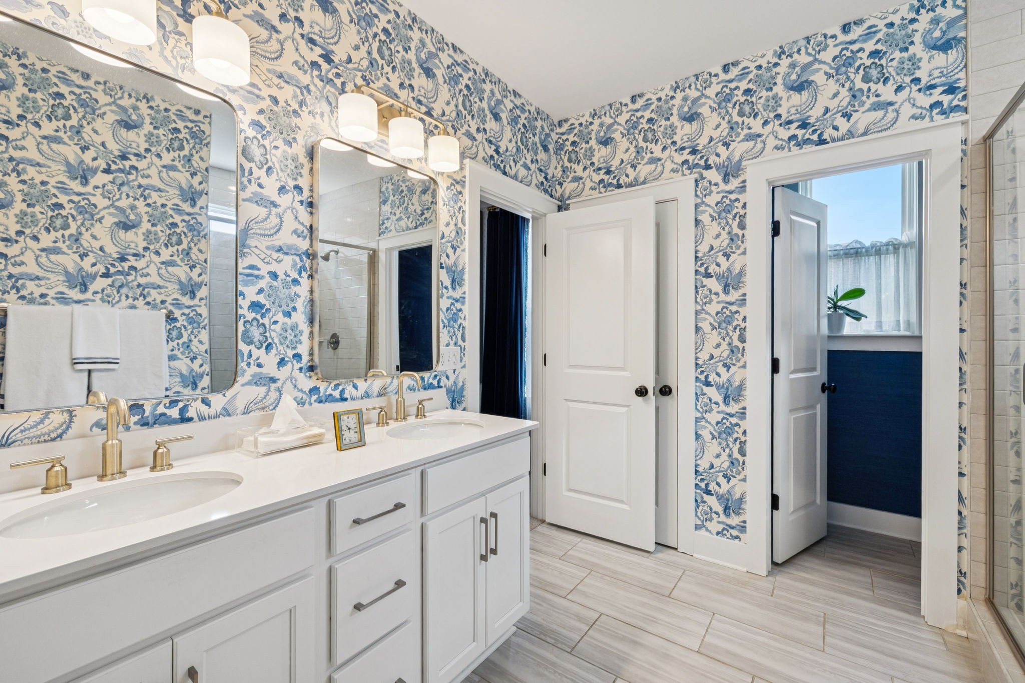 218 Southmen Lane Spring Hill, TN 37174 - Photo 44 of 73 a spacious bathroom with a double vanity sink and a mirror