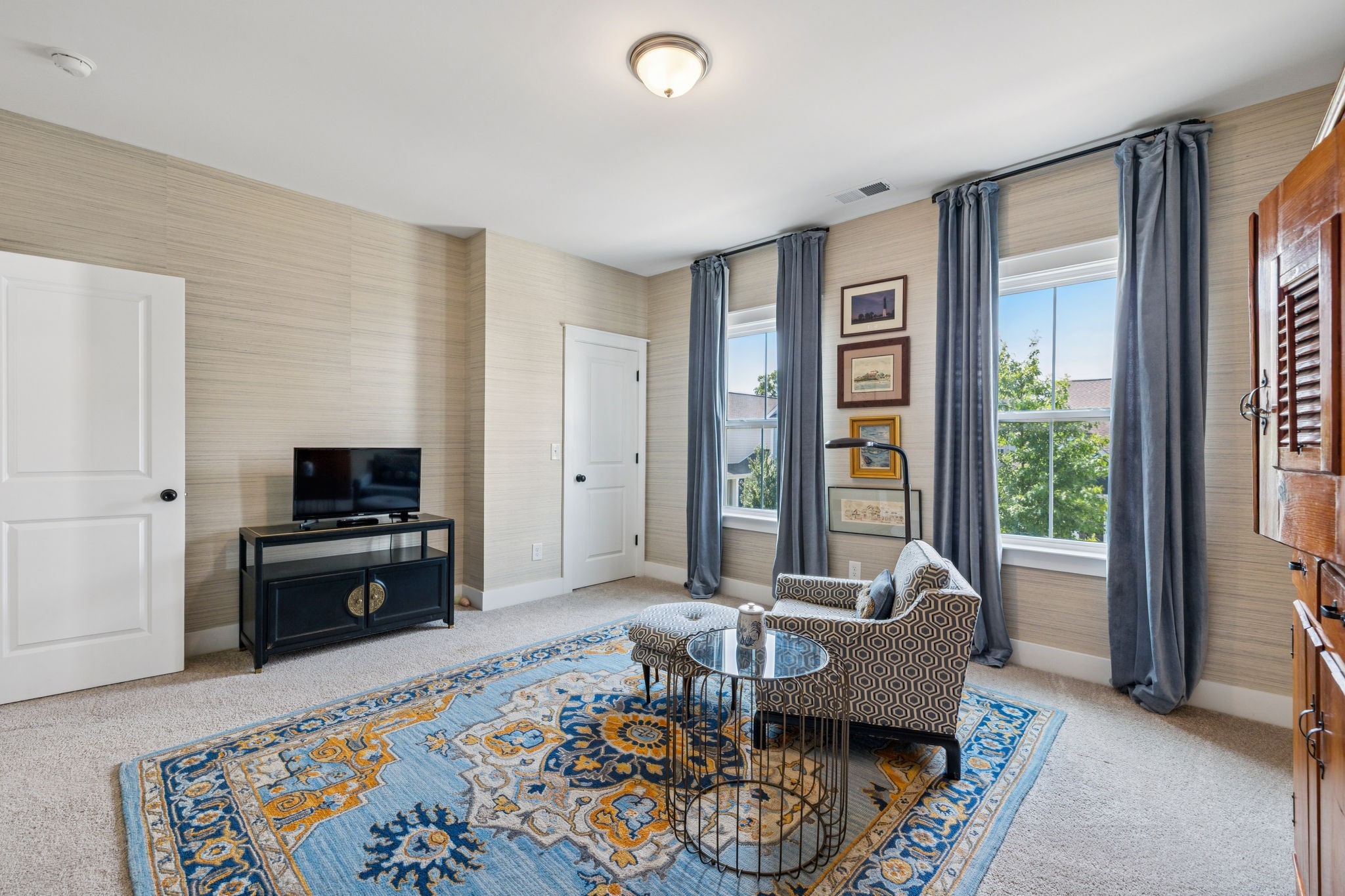 218 Southmen Lane Spring Hill, TN 37174 - Photo 47 of 73 a living room with furniture and a flat screen tv