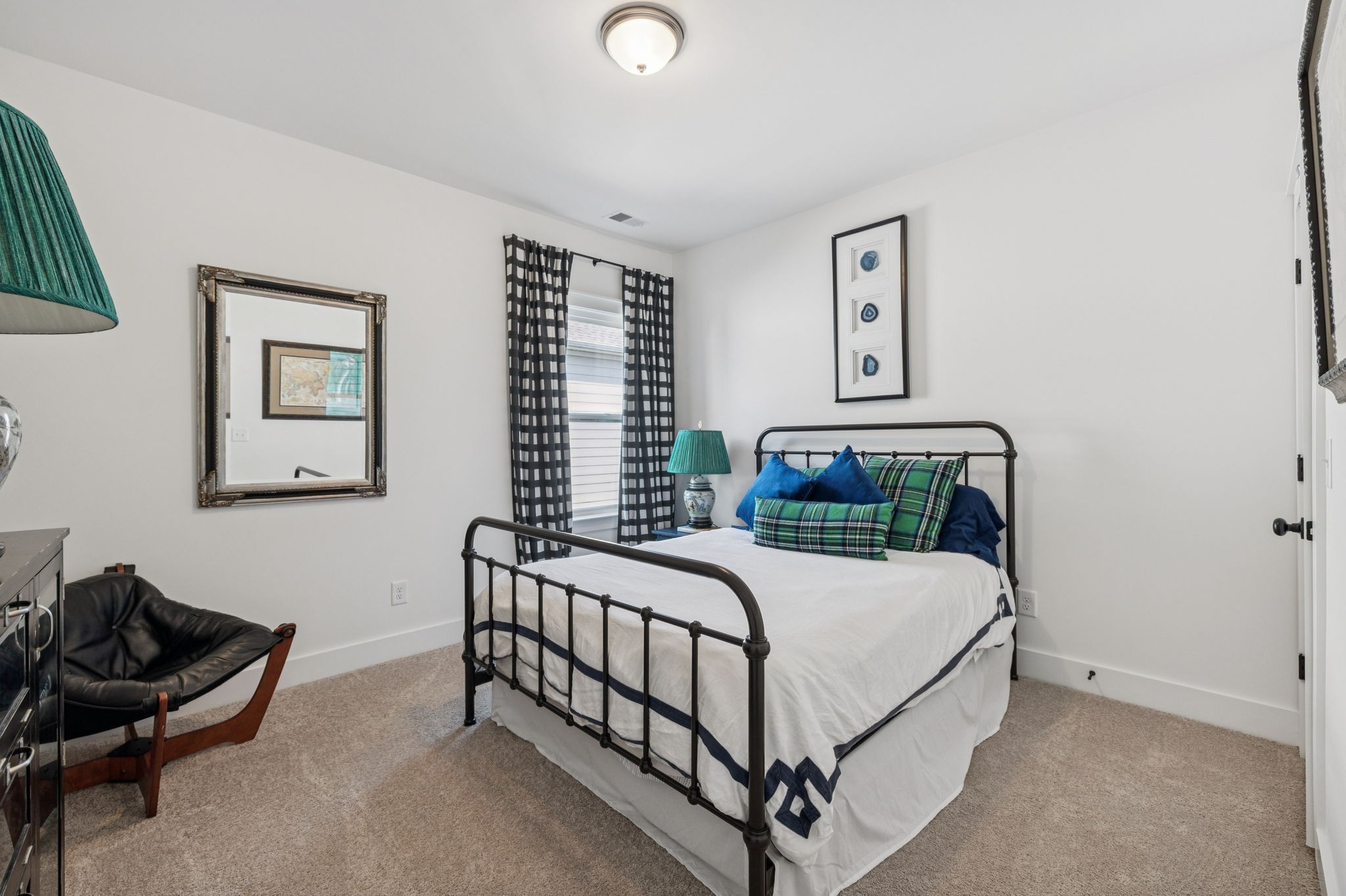 218 Southmen Lane Spring Hill, TN 37174 - Photo 49 of 73 a bedroom with a bed and chair