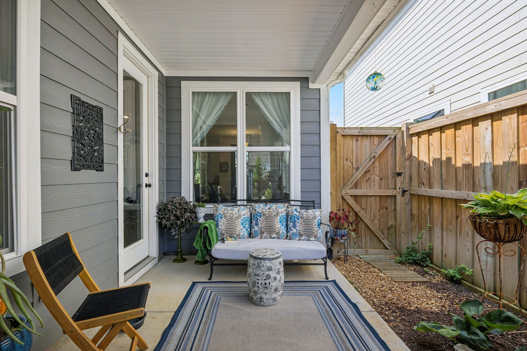 218 Southmen Lane Spring Hill, TN 37174 - Photo 61 of 73 a view of a patio with a chairs and table in a patio