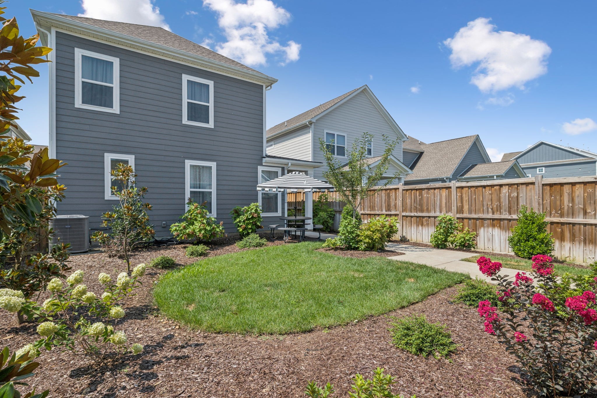 218 Southmen Lane Spring Hill, TN 37174 - Photo 64 of 73 a front view of a house with a yard