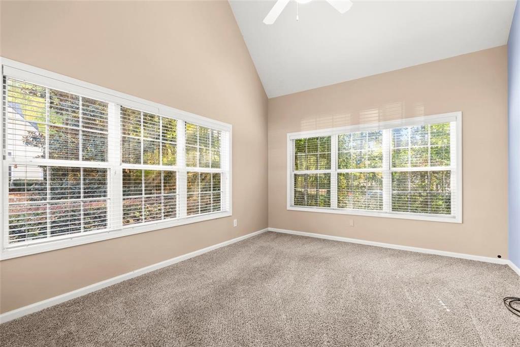 1225 Creek Forest Lane Austell, GA 30106 - Photo 19 of 32 a view of an empty room with a window